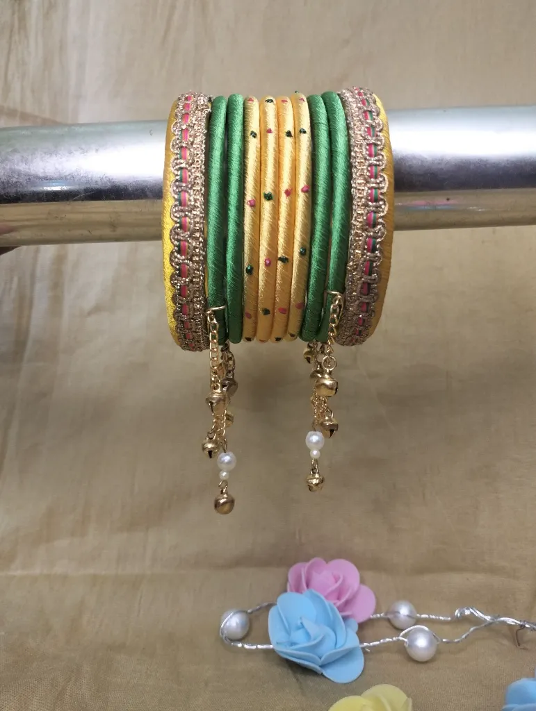 Golden Yellow & Emerald Green Thread Bangles with Pearl & Bell Charm Chain-PRISHAN-2.webp